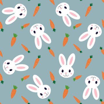Seamless pattern with cute white bunny faces and carrots on a blue background. Kawaii rabbit nursery illustration for kids fabric and wallpaper.