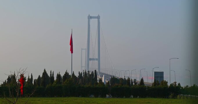 Osmangazi Bridge in Mist with Still Turkish Flag on Pole