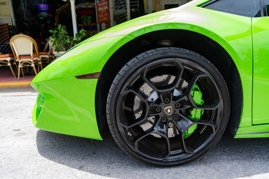 Miami, Florida, USA - July 12, 2025: Luxury green car Lamborghini Huracan LP580. Car of Lamborghini Huracan LP580 parked outdoor. Lamborghini, corner view. 2017 Lamborghini Huracan LP580-2 sport car