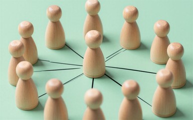 Obraz premium Wooden figures form a circle connected by lines to one central figure.