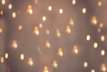 Fototapeta premium Background light bulb blurry background interior design bar table chair windows with copy space. Blurred background cafe coffee shop restaurant in shopping mall with light bokeh business event