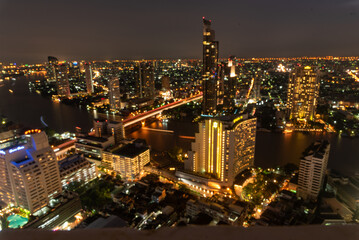 City twilight Amazing cityscape light. Panorama view of Bangkok city skyline night time sunset sky. Beautiful skyscraper midtown landscape. Capital building background modern office district
