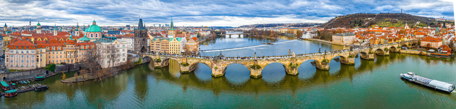 Charles Bridge Prague panorama over Vltava River and historic city skyline