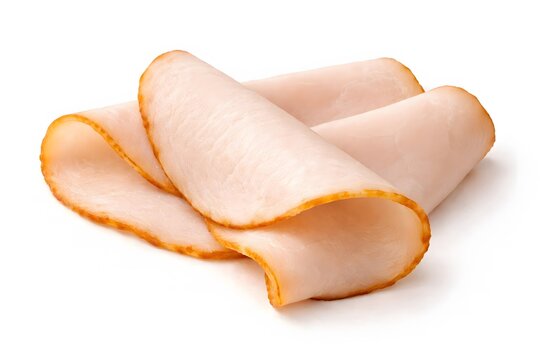 Slices of roasted turkey breast deli meat folded neatly together on plain white background