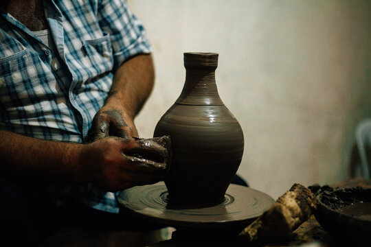 The potter makes a jug
