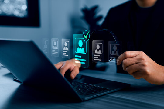 Digital recruitment and talent selection concept with business professional reviewing candidate profile on virtual interface, human resource screening and hiring decision process
