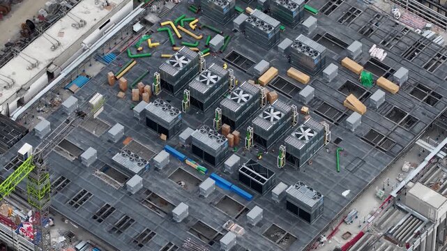 Aerial view of hvac system installation on a construction site roof
