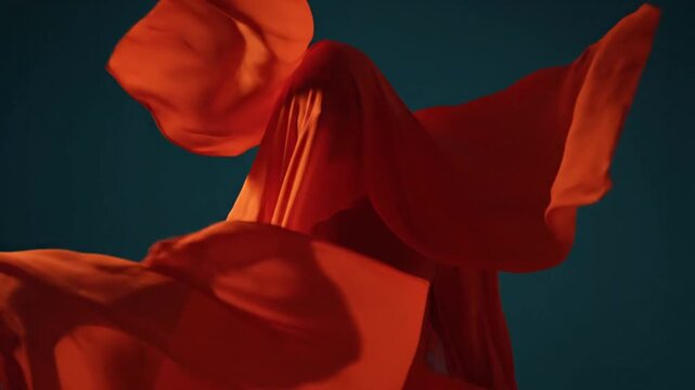 Dramatic Red Fabric Moving Slowly Downwards.