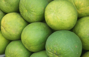 Many fresh pomelo fruits close up	