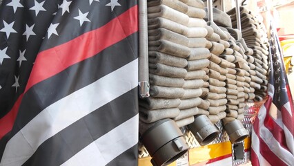 Red thin line black american flag on firefighter truck. Hose of firetruck and fire fighters symbol...
