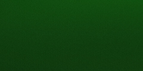 A close-up view of a textured green fabric or wall surface under dim lighting © MdSohanur