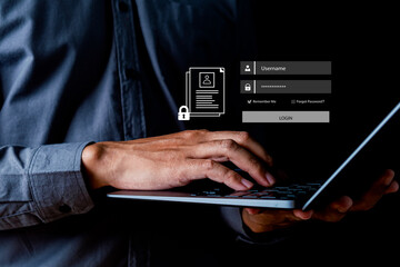 Business typing on laptop with secure login interface showing username and password fields, representing cybersecurity protection, identity verification, secure authentication account security