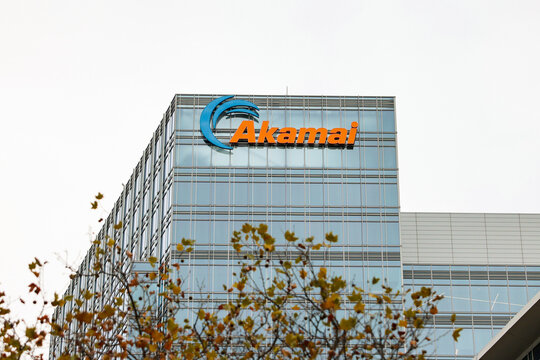 Cambridge, Massachusetts, USA &ndash; Akamai Technologies logo displayed on the exterior of a modern office building in the Kendall Square technology and innovation district.