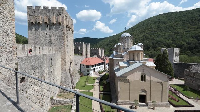 Central church building dedicated to Holly Trinity in Manasija Monastery, Serbia. Austere design, sandstone walls, represent religious European medieval architecture 