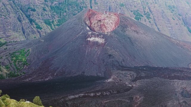 Aerial drone footage of Barujari active volcanic cone within Mount Rinjani caldera