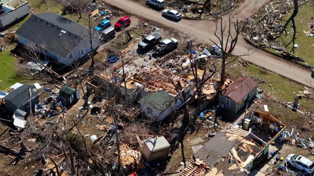 Severe tornado aftermath captured by drone revealing destroyed homes and scattered debris across a neighborhood