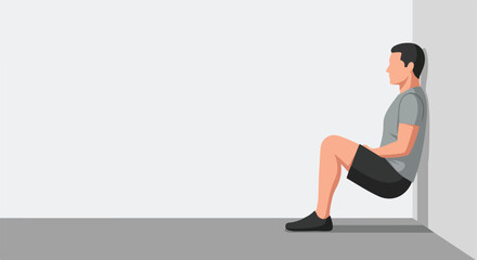 Obraz premium Man leaning against a wall doing a squat exercise