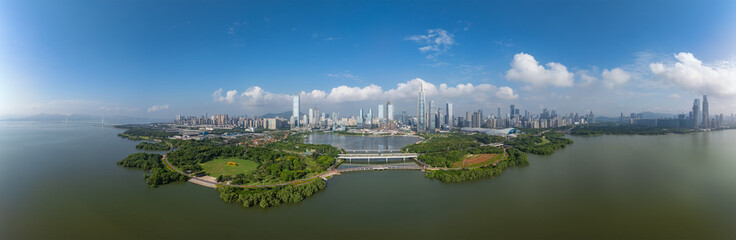 Drone fly over Shenzhen city central business district, aerial panorama China.