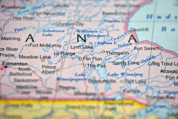 Naklejka premium Flin Flon Manitoba Canada Location on World Map with Defocused Background Geography Concept
