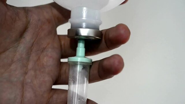 Crisis Patient Recovery from Accident Close up of IV drip in hospital slowly Dripping saline Recovering patient in a hospital Surgeons or chemotherapy