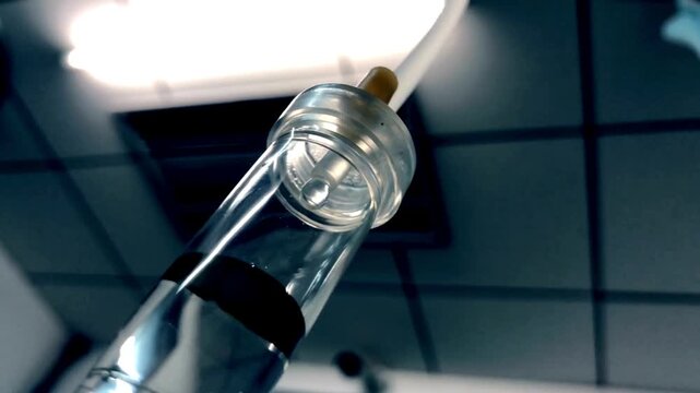 Crisis Patient Recovery from Accident Close up of IV drip in hospital slowly Dripping saline Recovering patient in a hospital Surgeons or chemotherapy