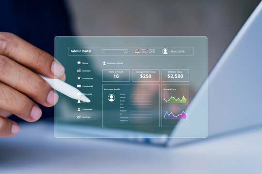 Business analytics dashboard interface on virtual screen with stylus pen, admin panel UI showing customer profile, KPI metrics, statistics and data visualization for digital management platform