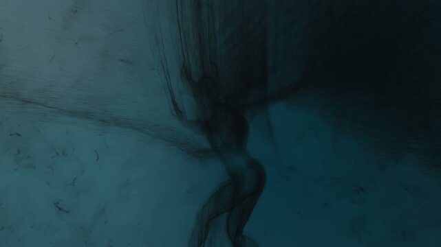 3d animation of an evil creature scouting in the shadows, built from particles