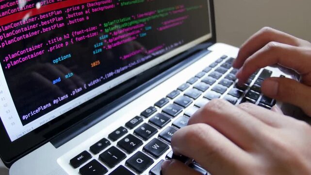 Close up of freelancer's hands typing code on laptop Web application development. programming and . software, developer. Develop project software UHD
