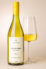 Naklejka premium White wine bottle mockup with glass