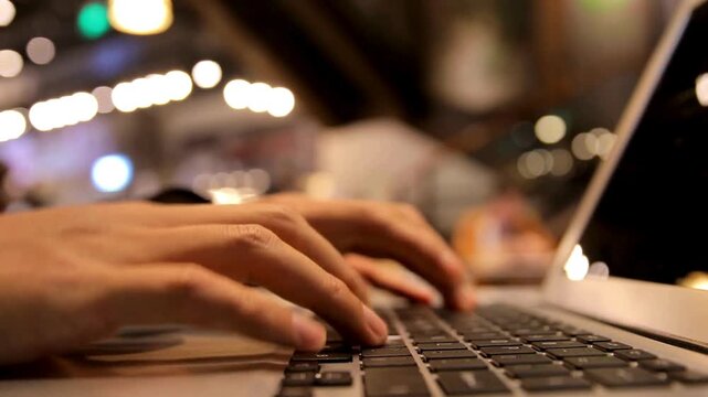 software developer hands typing data coding programming javascript with laptop computer designing artificial intelligence project in office background