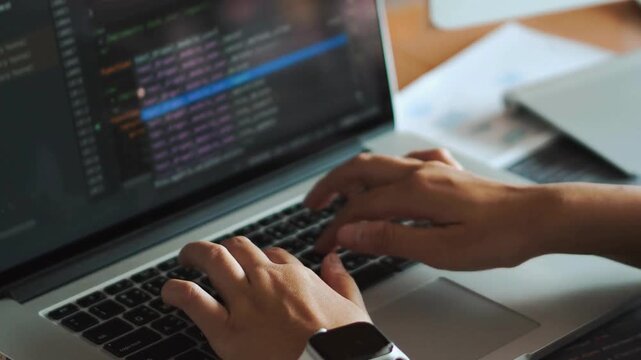 developer Doing Coding, typing code on screen programmers coding internet security system Professional male developer programming apps doing project