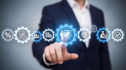 Businessman interacting with digital icons and gears on a gray background