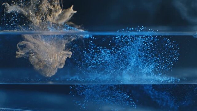 Blue Particle Energy Collision Creating Abstract Scientific Explosion
