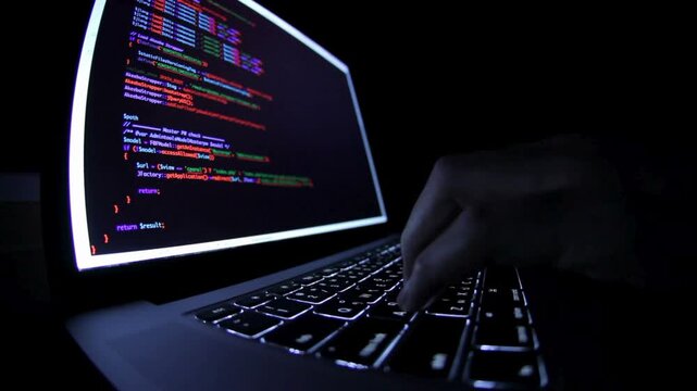 IT software developer hands typing data coding programming with laptop computer, Man fingers texting concept. Man working with develop bot AI online,