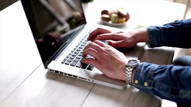 Person Typing on the Laptop Keyboard. Hands Coding on Laptop CLOSE UP. Software, cloud data social network media or virus. Closeup coding on screen