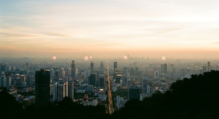 Fototapeta premium Aerial View of Kuala Lumpur Skyline at Sunset with Fireworks