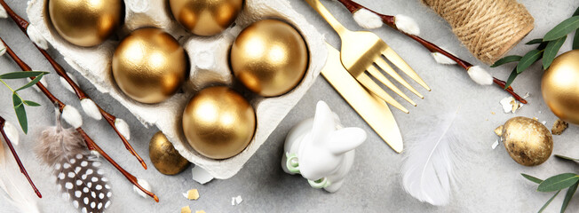 Luxury Easter Composition with Golden Eggs and Spring Decor