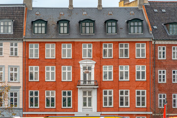 Fototapeta premium Red Brick Building Facade In Copenhagen, Denmark, Classic Scandinavian Architecture