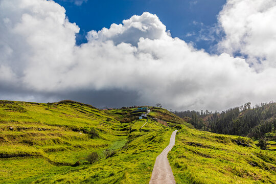 Green hills and footpath at Miradouro da Boa Morte Madeira Portugal