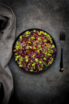 Quinoa and edamame salad with pomegranate seed and red cabbage