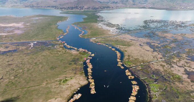 Drone view, Uros floating islands made with totora reeds on Lake Titicaca, Peru