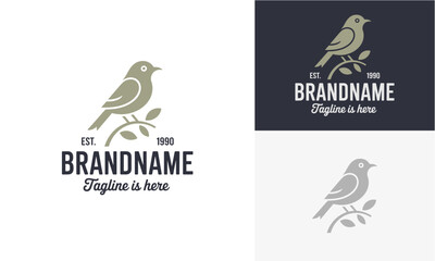 Obraz premium Elegant bird perched on a branch logo design, representing nature and branding identity