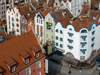 Stylized townhouses with fantasy-like facades in Old Town Elbląg, seen from above