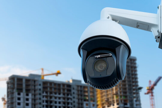 Construction site security camera monitoring building activity during the day