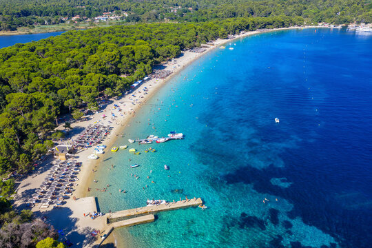 Aerial view of the beautiful Koukounaries beach and bay on the island of Skiathos, Sporades, Greece