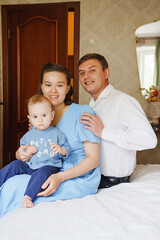 Family portrait in a cozy home setting during the day