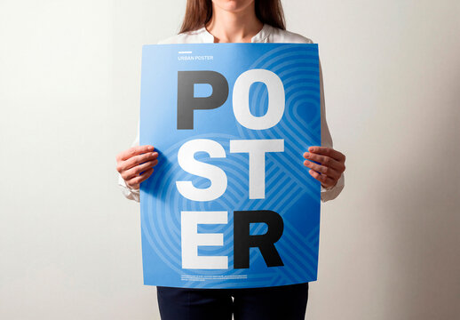 Woman holding large blank poster