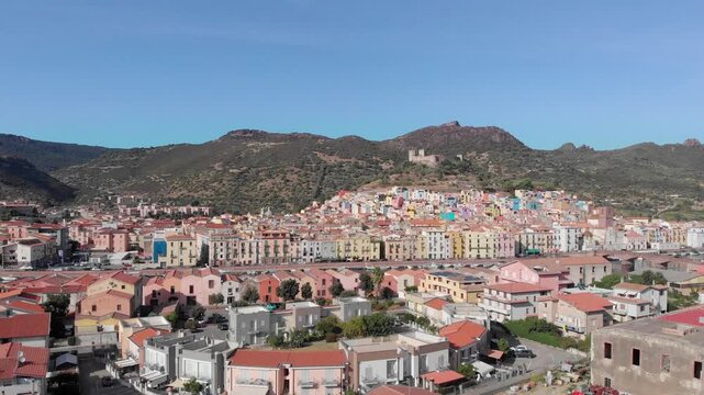 Aerial: Vertical Drone Rise Over Bosa and Serravalle Castle, Sardinia, Italy