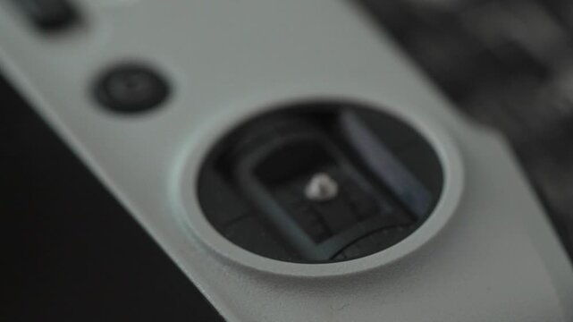 Close Up Shot of Hand Removing Joystick From Drone Controller