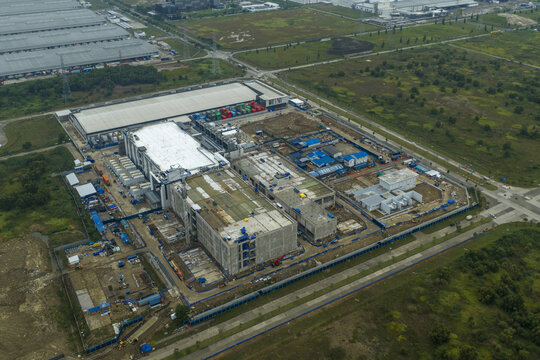 Aerial view of large scale data center construction site, showing industrial infrastructure development and ongoing building process, Beijing, China